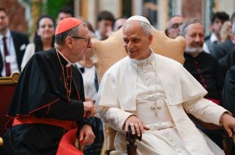 Pope Leo XIV speaks with Cardinal Claudio Gugerotti, prefect of the Dicastery for Eastern Churches, during an audience with members of ROACO, a Vatican coalition of Catholic charities at the Vatican June 26, 2025.