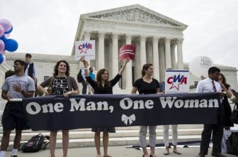 Supporters of protecting the definition of marriage as the union of one man and one woman rally in front of the U.S. Supreme Court in Washington June 26, 2015, shortly before the justices handed down a 5-4 ruling that states must license same-sex marriages and must recognize same-sex marriages performed in other states.