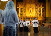 Altar servers lead the closing procession during a traditional Latin Mass at Immaculate Conception Seminary in Huntington, N.Y., in this July 1, 2021, file photo.