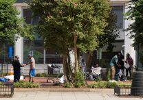 People are seen at a homeless encampmentnear the Inter-American Development Bank in Washington Aug. 11, 2025. President Donald Trump said that day he will place the D.C. Metropolitan Police Department "under direct federal control," activate the National Guard, and "get rid of the slums" in what he called an effort to combat crime in the nation's capital.
