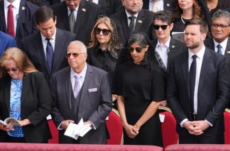 U.S. Vice President JD Vance, right, and second lady Usha Vance, stand next to Louis Prevost, brother of Pope Leo XIV, and his wife, Deborah, left, at inauguration Mass of Pope Leo XIV's pontificate in St. Peter's Square at the Vatican May 18, 2025. President Donald Trump and JD Vance met Louis and Deborah Prevost at the White House May 20.