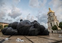 The "Black Cloud" installation by Ukrainian artist Oleksiy Sai (Liosha Say) is displayed near Holy Wisdom Cathedral, or St. Sophia Cathedral, in central Kyiv June 8, 2025. The cathedral was damaged in large-scale Russian drone attack on Kyiv and Odesa June 10 that killed up to seven people and injured up to 13 others. In a chilling evocation of Russia's all-out invasion of Ukraine since February 2022, the art installation includes the sounds of artillery fire, explosions, drones and military vehicles.