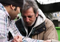 Praying with homeless